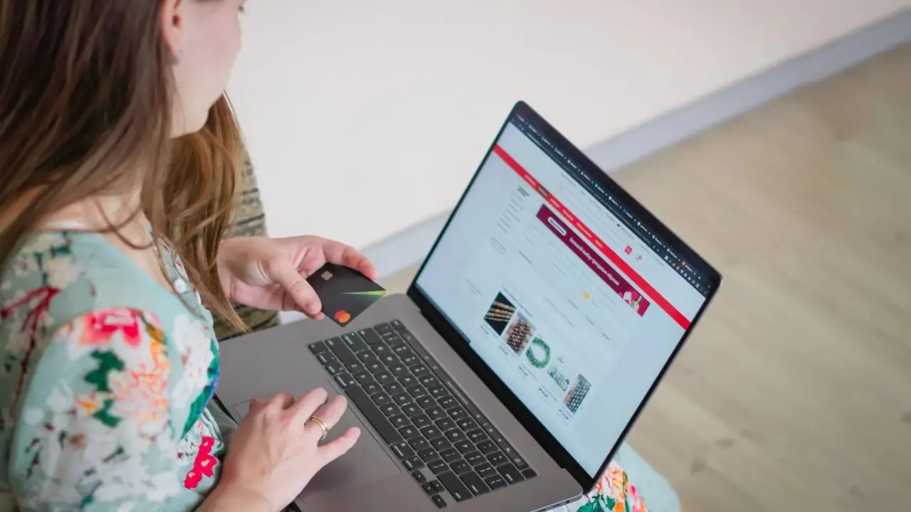 Person browsing an online shop on a laptop