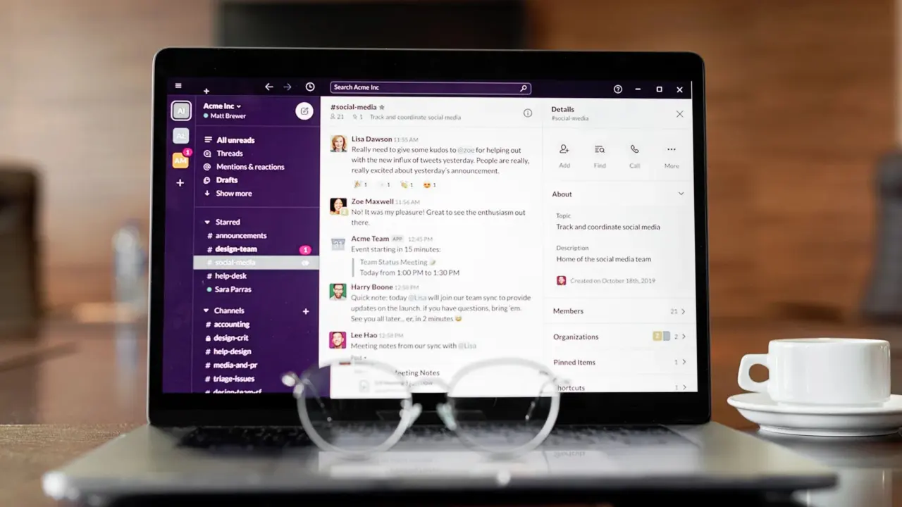 A laptop on a desk with an email inbox open